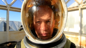 John Adams in a pressure suit, SAM at Biosphere 2